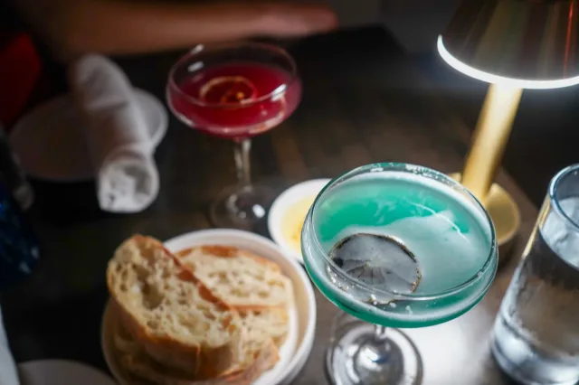 An overhead view of colorful cocktails at Reggiano’s