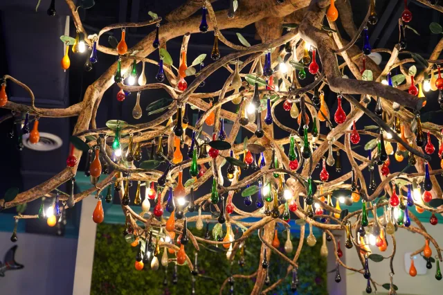 Warm decorative lights above the dining room