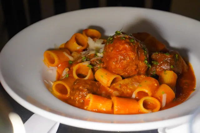 Meatballs and pasta at Reggiano’s, photographed by Faye Constant