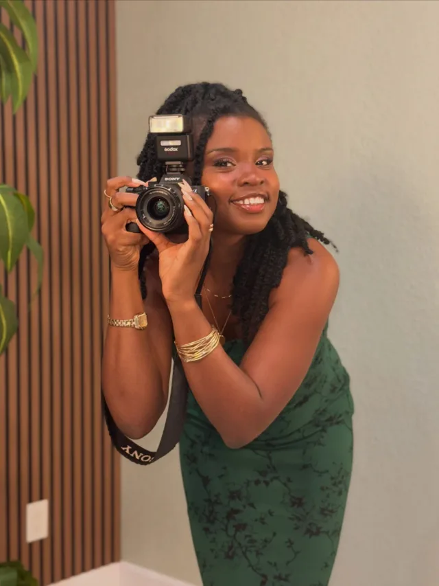 Faye Constant holding her camera
